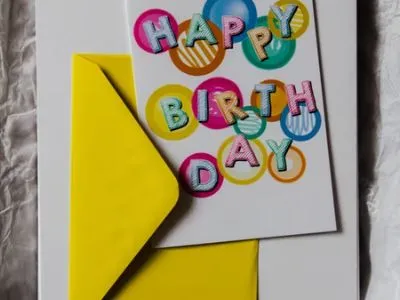 Happy Birthday card with yellow envelope